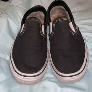 Black and white slip on vans
